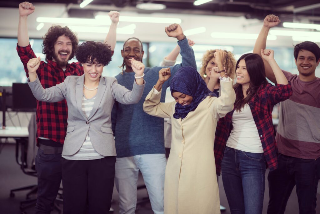 diverse employees participating in a group employee wellness programs